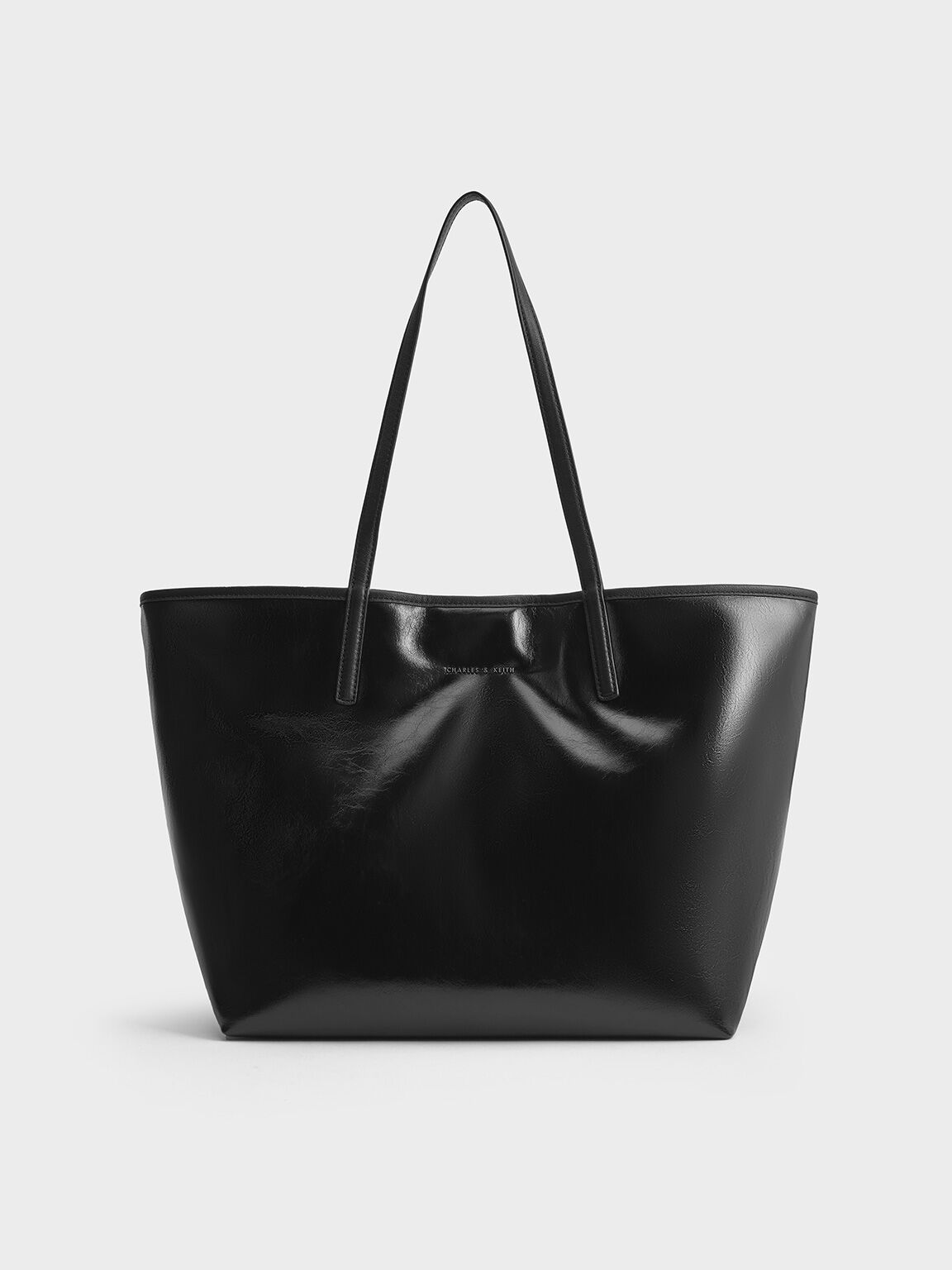 กระเป๋าโท้ทลายย่นดีไซน์แบบใช้ได้สองด้านรุ่น Sianna, สีดำอะไหล่สีเงิน, hi-res