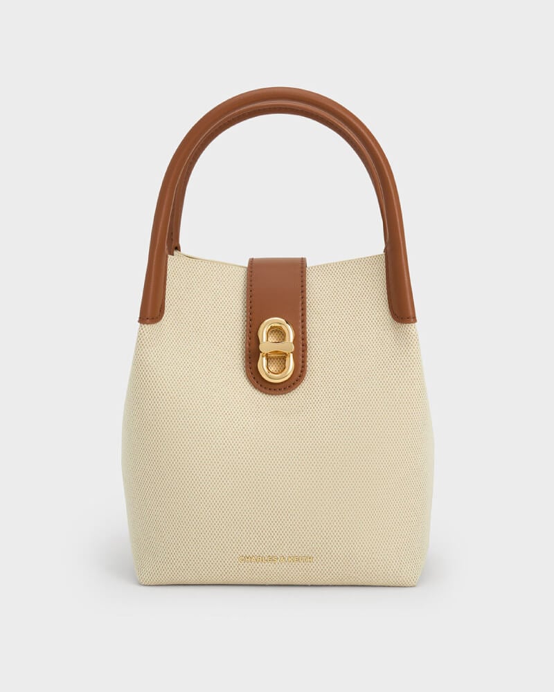 Women’s Aubrielle canvas bucket bag in tan - CHARLES & KEITH
