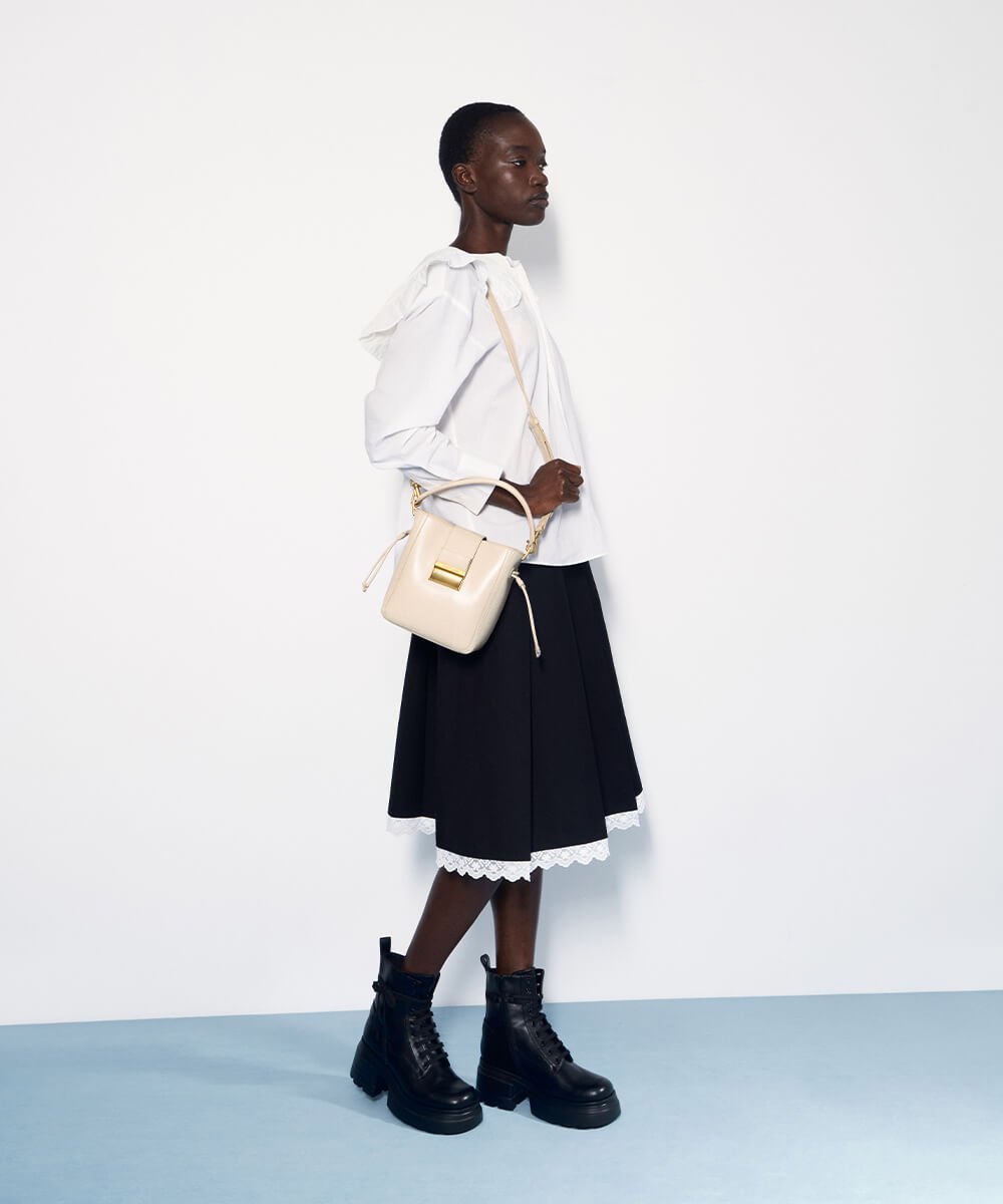 Women’s Charlot elongated bucket bag and lace-up chunky ankle boots in black – CHARLES & KEITH