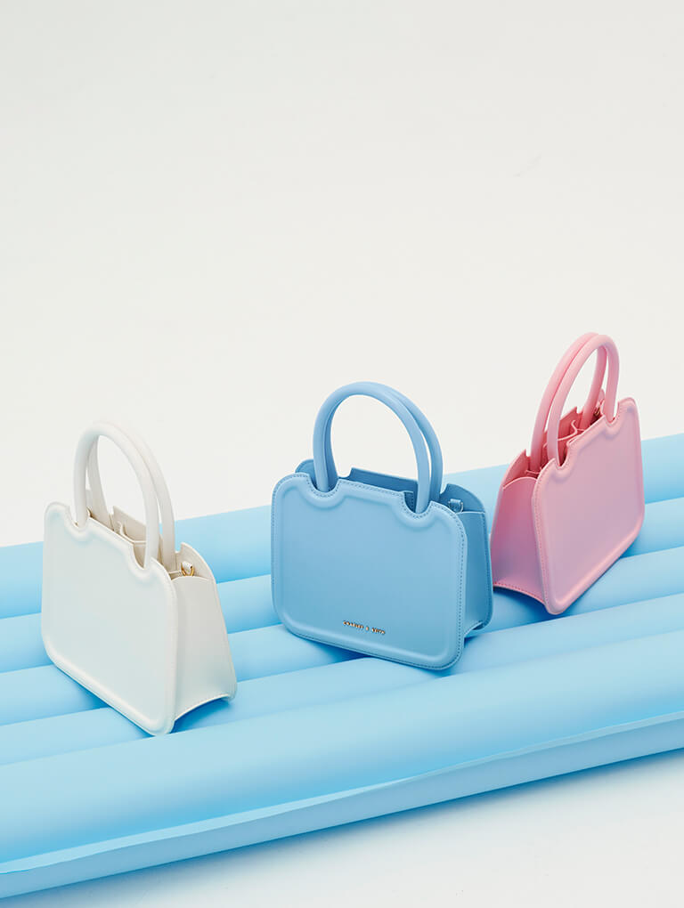 Neomi Micro Handbag in Blue Ostrich Effect Leather