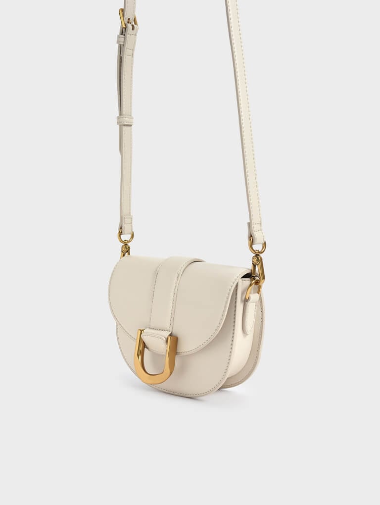 Women’s Mini Gabine Saddle Bag in cream – CHARLES & KEITH