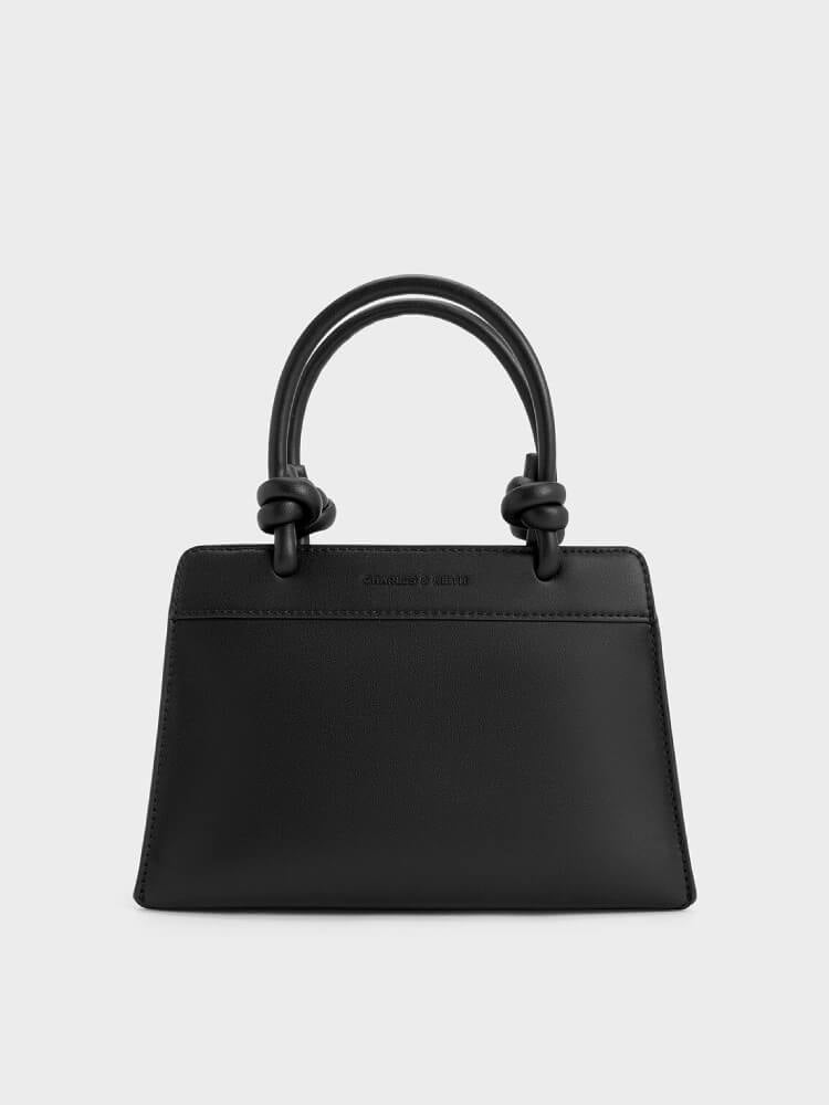 Women’s Sabine knotted-handle trapeze tote bag in jet black - CHARLES & KEITH