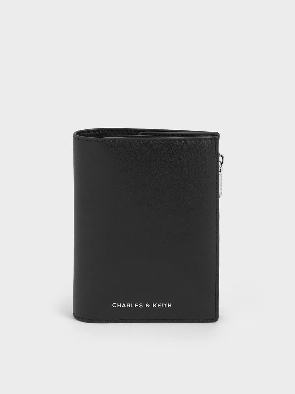 Women’s Noelle passport holder in black - CHARLES & KEITH